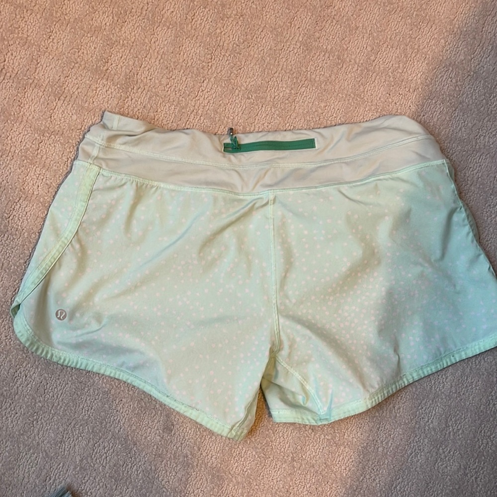 Lululemon size 10 athletic shorts. Seafoam green with white polka dots